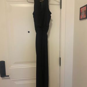 Calvin Klein sexy, sleek and flattering jumpsuit with gold neck collar size 12